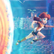 Daisy jumps out of a portal in Mario Strikers: Battle League.